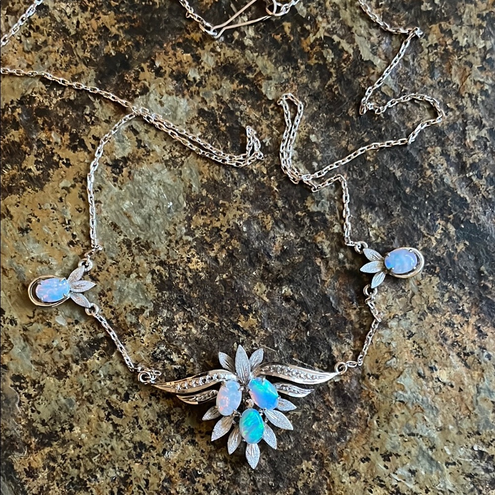10 K White Gold & Opal Necklace. Chain is 18” in length.